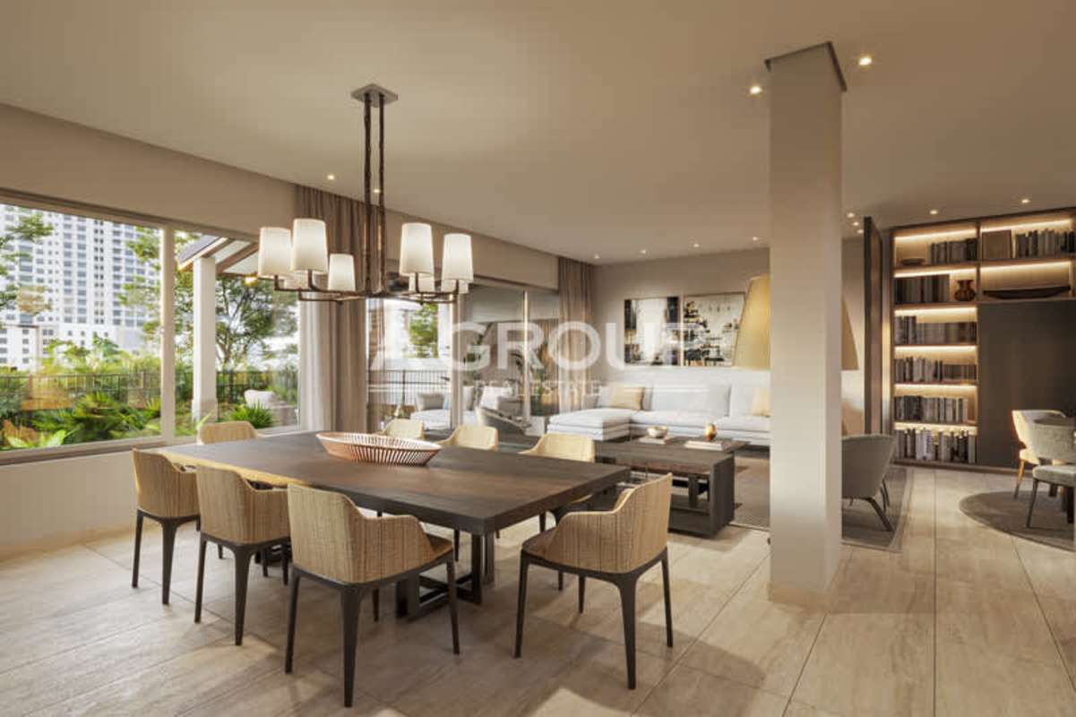 Living room with large windows, minimalist furniture and stair railing The Woods Santa Maria Panama