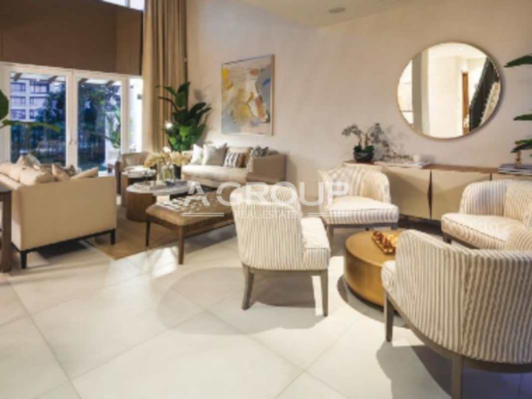 Open dining and family space with large windows modern lighting and golf views at luxury duplex Santa María Panama