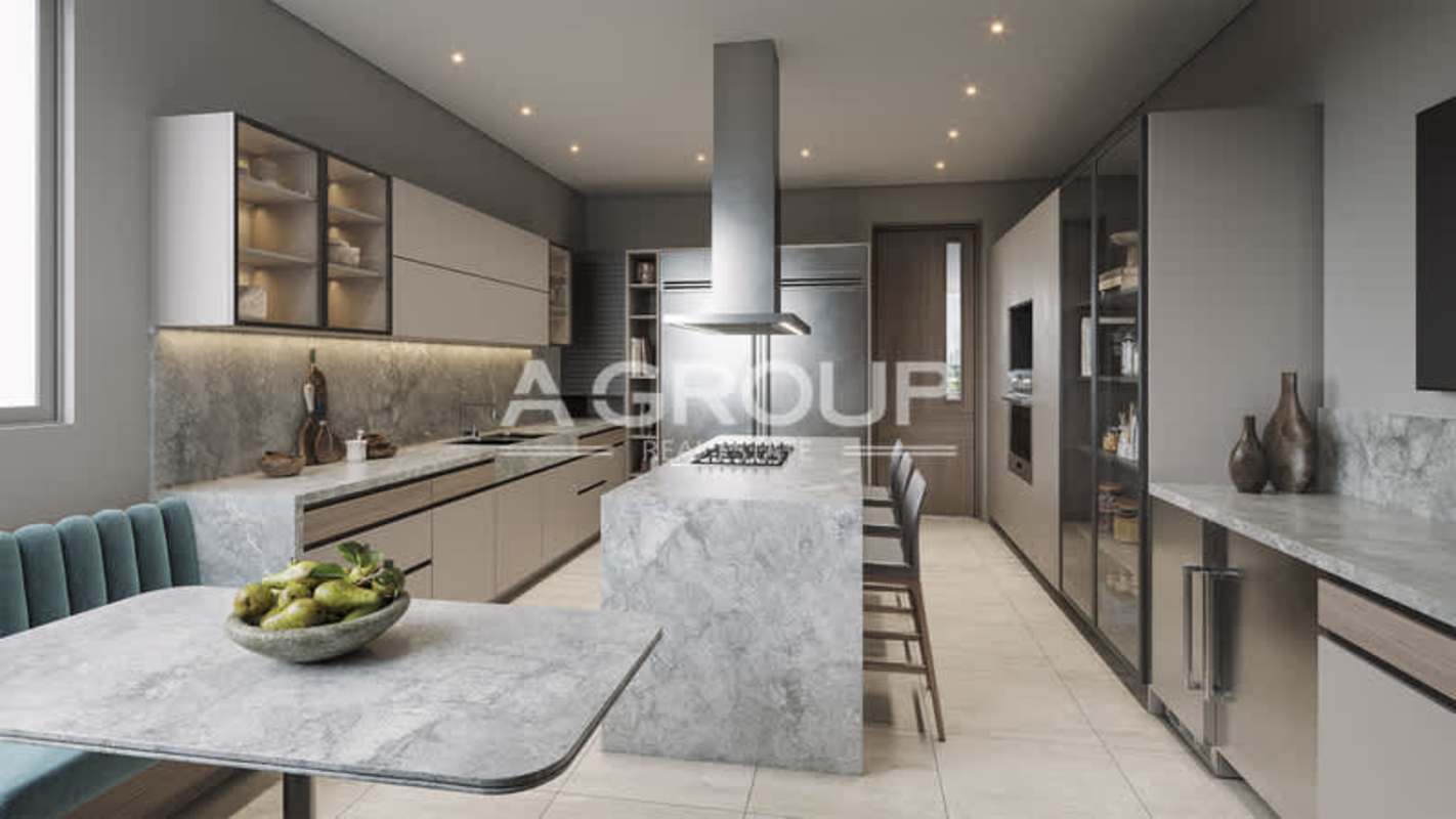 Spacious kitchen with large marble island stainless appliances in Santa Maria Panama