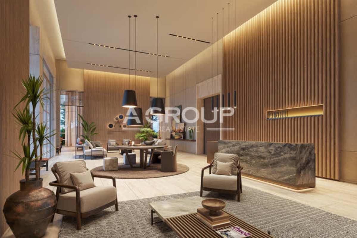 Spacious lobby lounge with high ceilings and natural light in PH Corotú Santa María