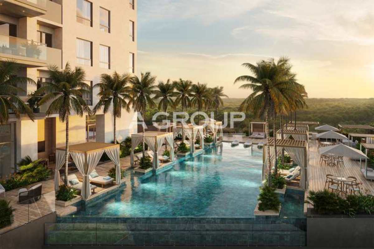 Modern tropical shared lounge with dining, large mural, bar counter at PH Corotú Panama