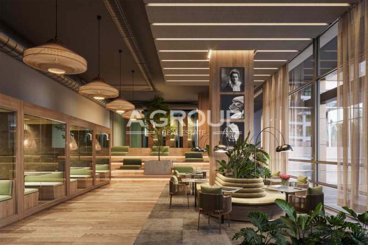 Luxurious open-concept living area with kitchen island and dining at PH Corotú