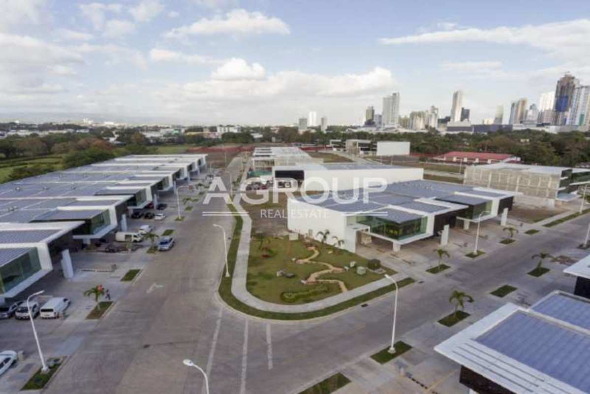 Aerial perspective of Panama Viejo Business Center business park with solar panels and landscaped areas