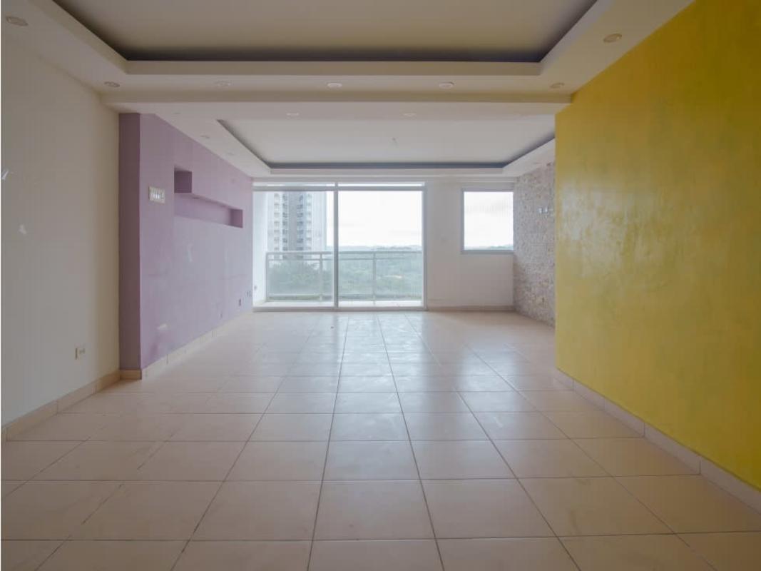 Kitchen with granite countertops and wood cabinets in foreclosed apartment Constellation Tower El Dorado