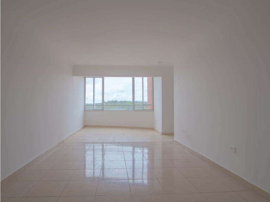 Empty bedroom with built-in closet, tile floor and window at PH Royal Hills Villa de las Fuentes