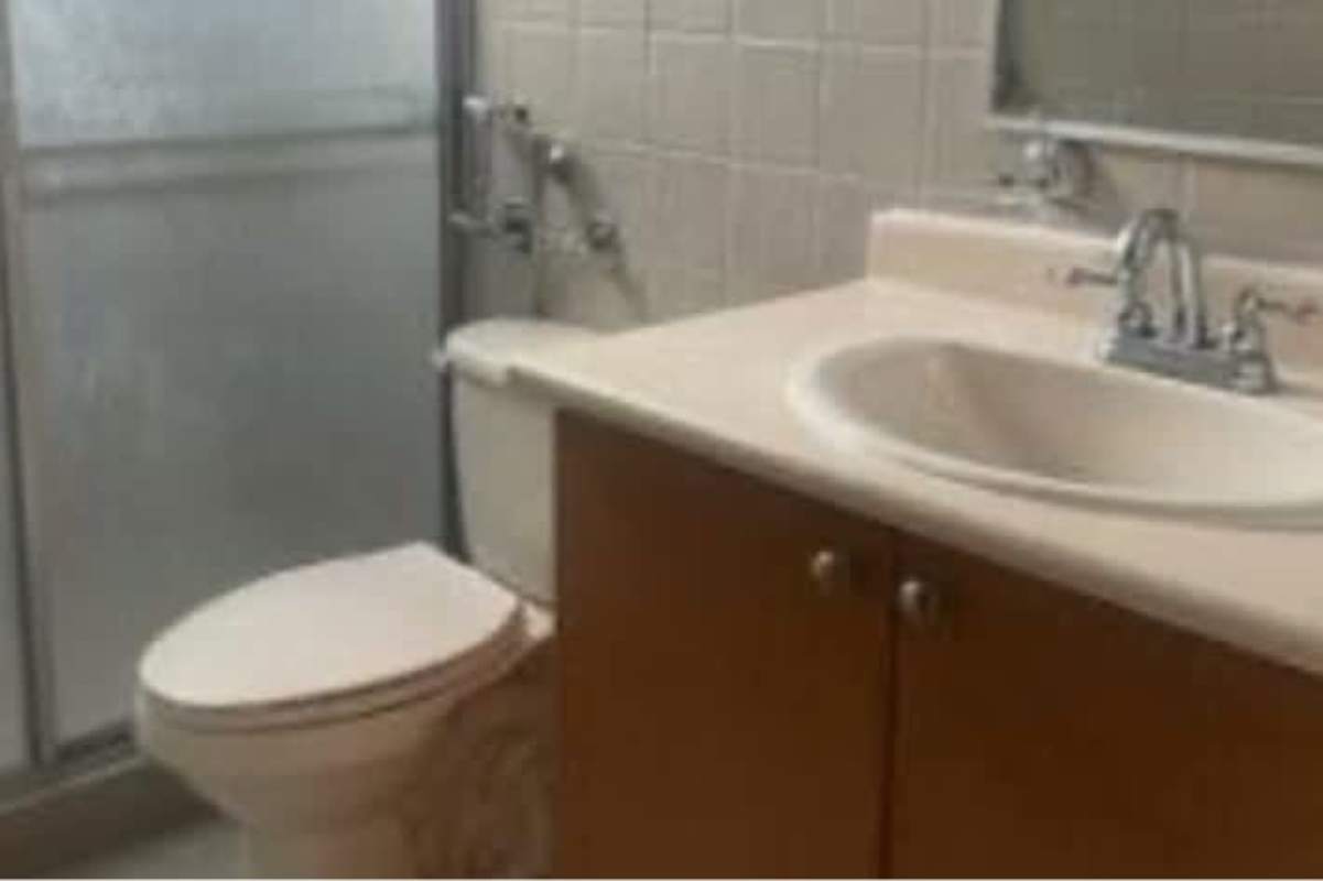 Contemporary bathroom with glass shower, vanity, tile PH Costa del Este Tower Panama