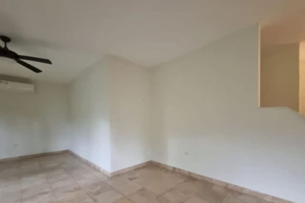 Spacious walk-in closet with wood cabinetry luxury house Clayton Panama