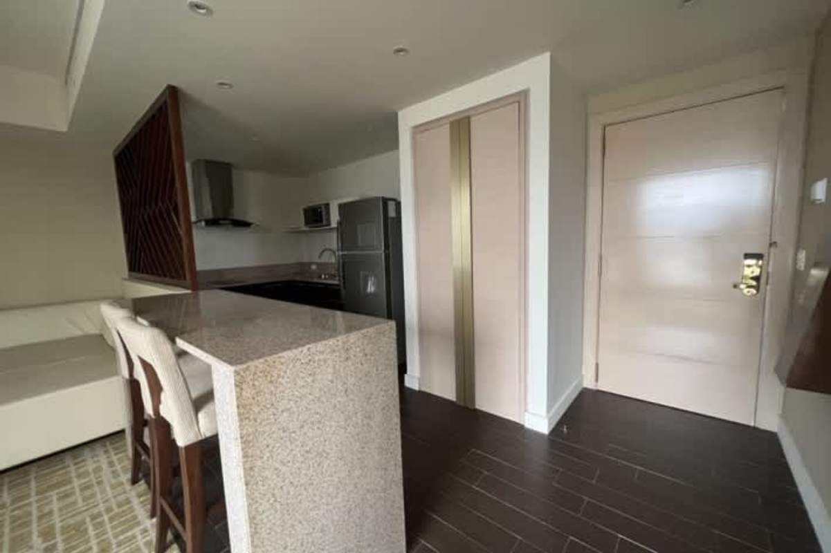 Luxury bedroom furnished with large window and city view in PH Waldorf Astoria Calle Uruguay Panama