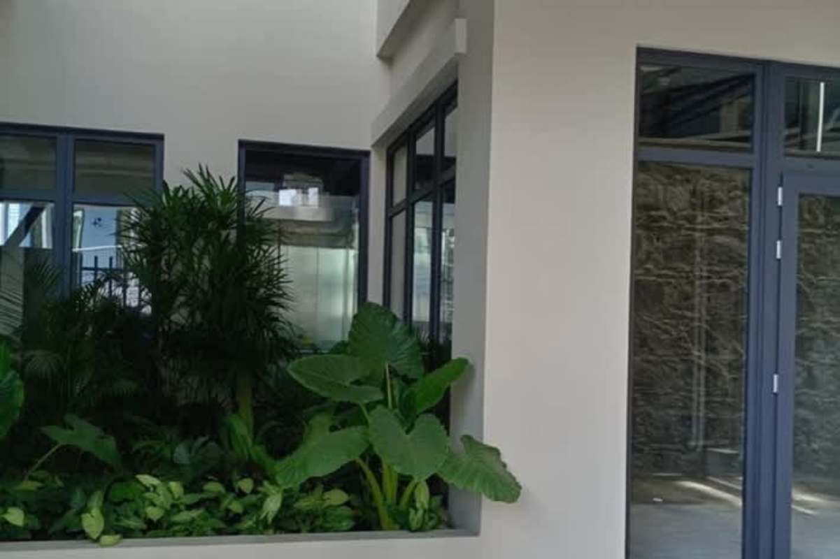 Commercial unit patio style stone wall glass entrance La Plazuela Alfaro Casco Viejo Panama