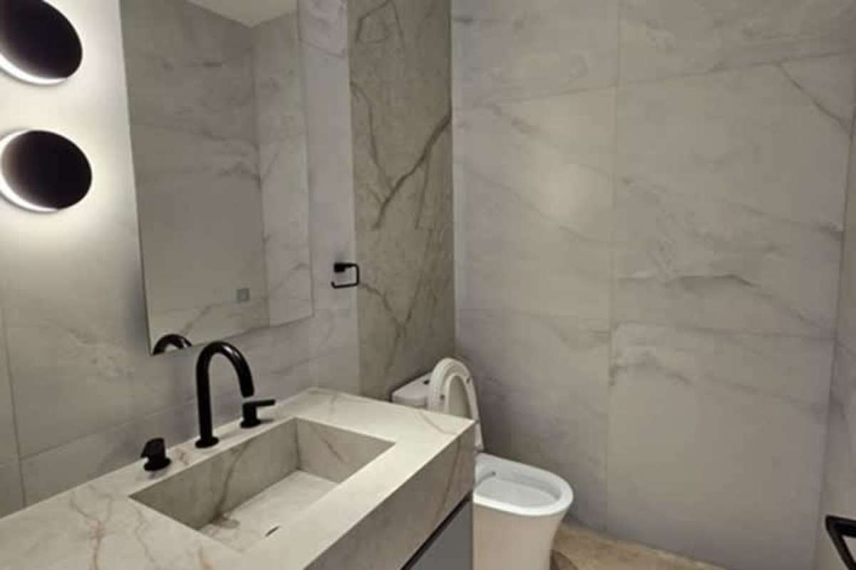 Luxury bedroom with large windows ocean and skyline views modern decor PH Pacific Point