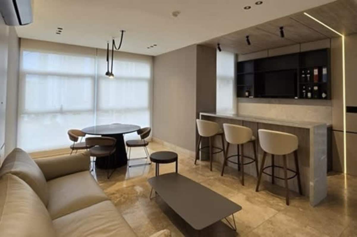 Contemporary open living dining kitchen area with ocean and skyline views PH Pacific Point Panama