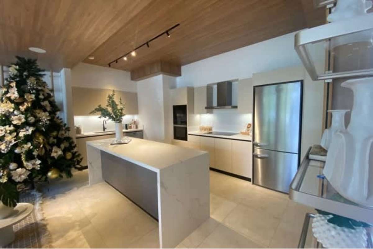 Premium kitchen with granite counters, built-in appliances in luxury Santa Maria Panama apartment