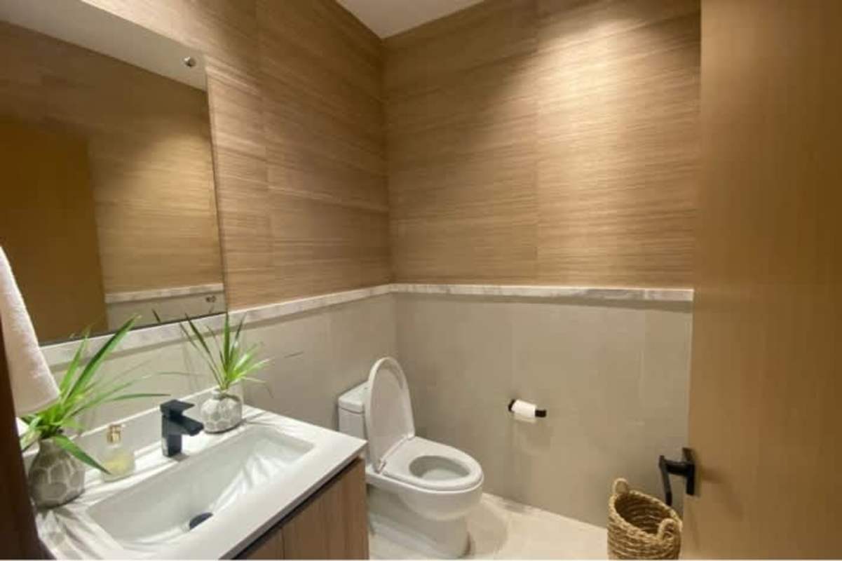 Walk-in closet with custom cabinetry luxury Santa Maria apartment Panama