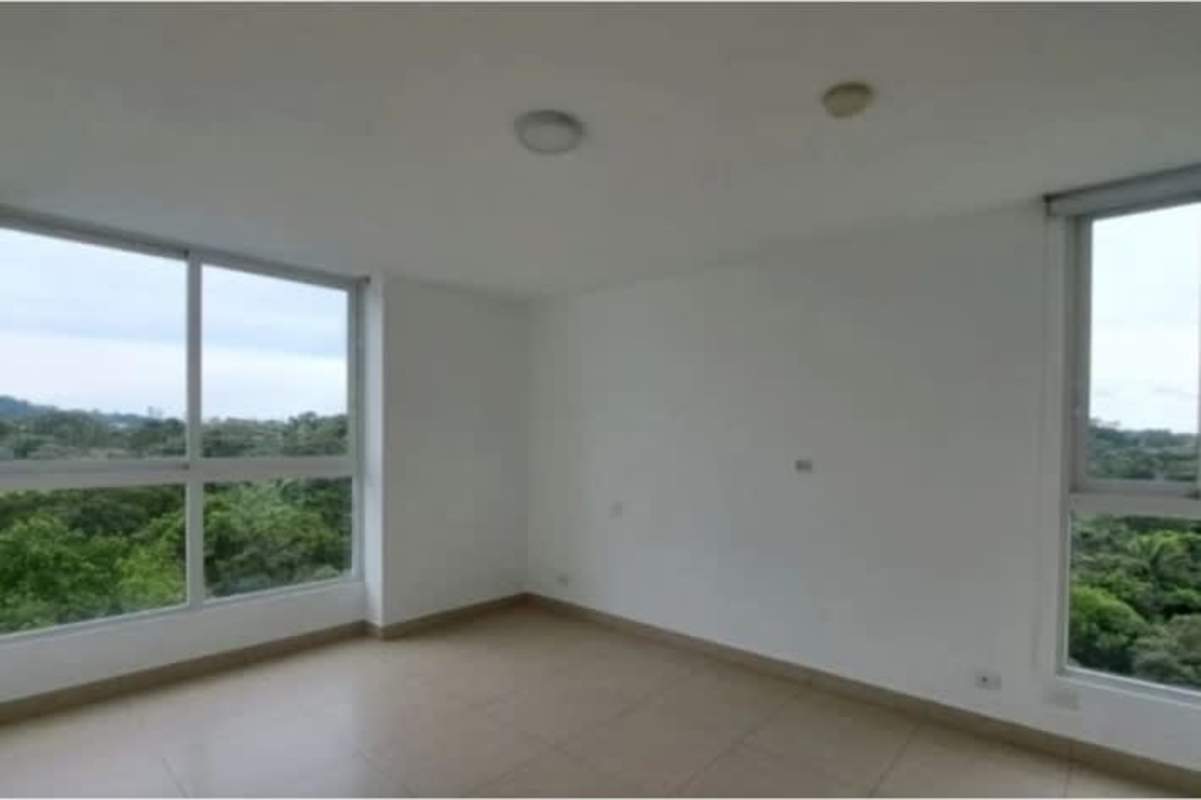 Bright bedroom with large window overlooking greenery PH Clayton Park Clayton Panama
