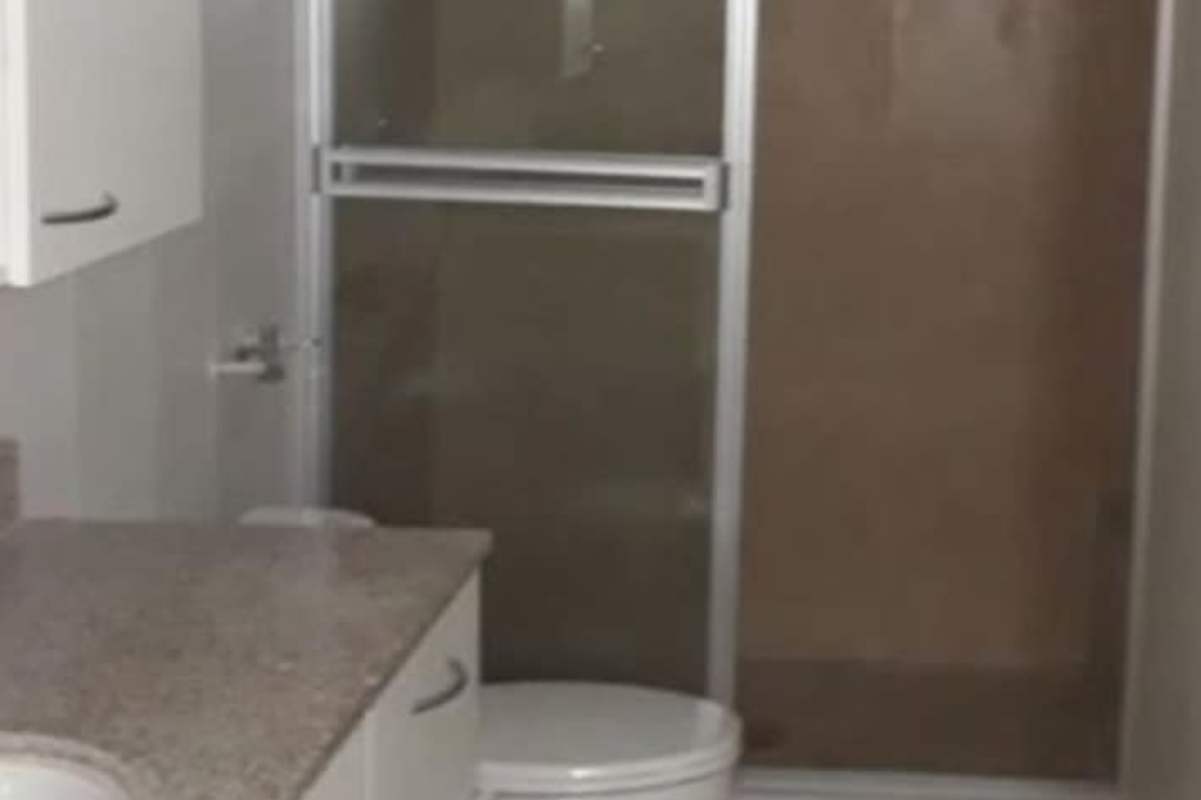 Laundry area with sink and service quarters with bathroom Clayton Park Panama