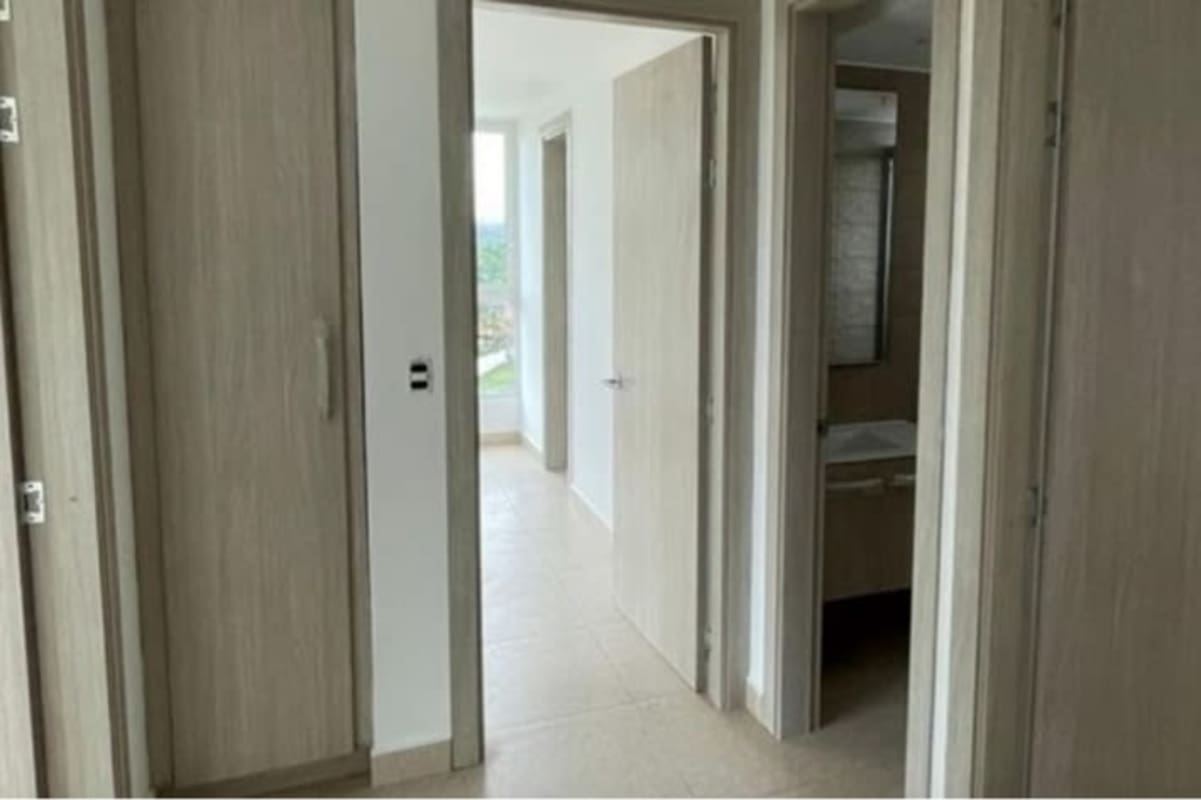 Bright hallway with multiple doors and closet space PH Clayton Park Panama City