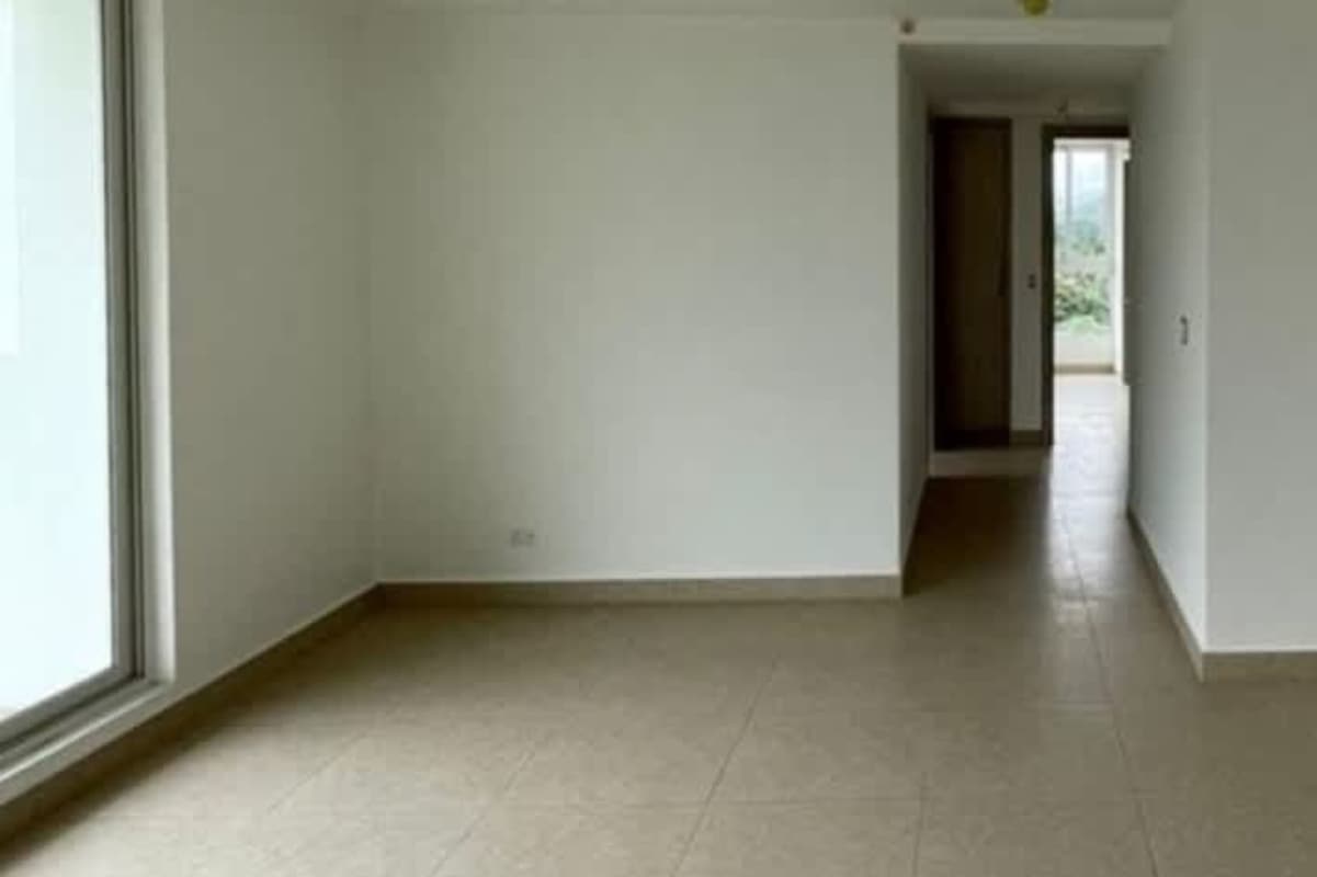 Modern bathroom with granite vanity and glass shower enclosure in Clayton apartment Panama