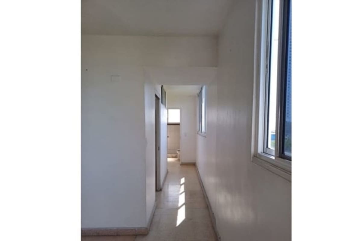 Bright hallway with large window ceramic tiles Bella Vista Panama apartment for rent