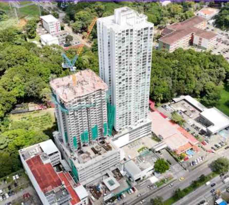 Open living dining space and modern kitchen with black granite at Coral Plaza Panama