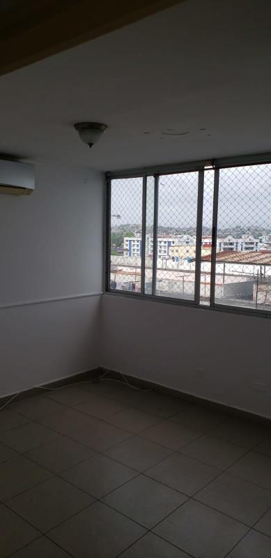 Living space with open kitchen, breakfast bar, ceiling fan in PH Plaza España Panama City