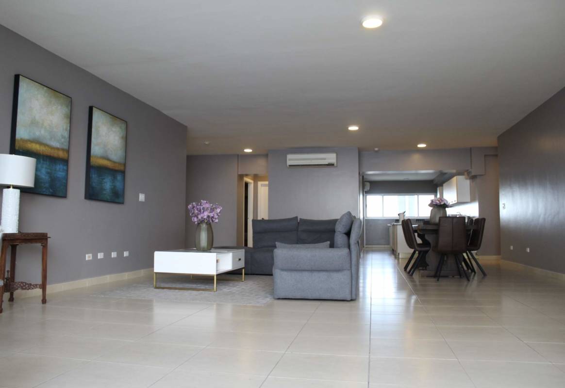 Spacious master suite with large window and ocean views at Waters on the Bay