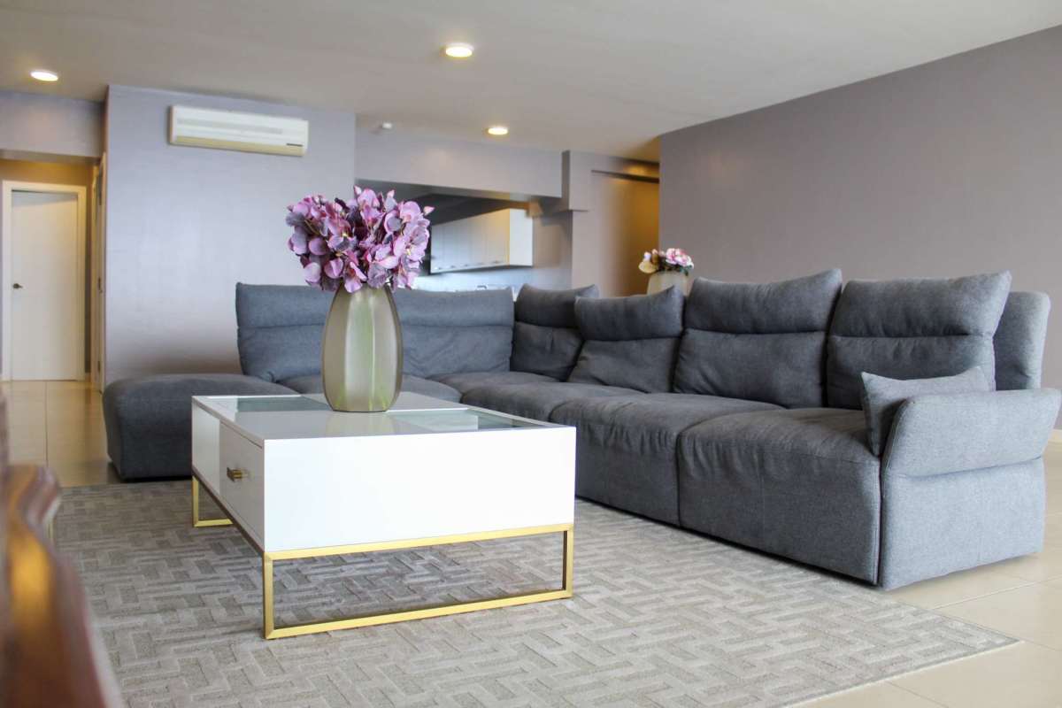 Modern kitchen with granite island, stainless appliances and ample cabinetry at Waters on the Bay Panama