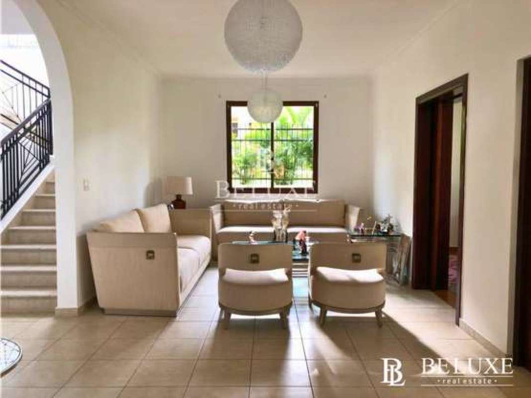 Modern living room with staircase ceramic floor and garden view Camino de Cruces Panama