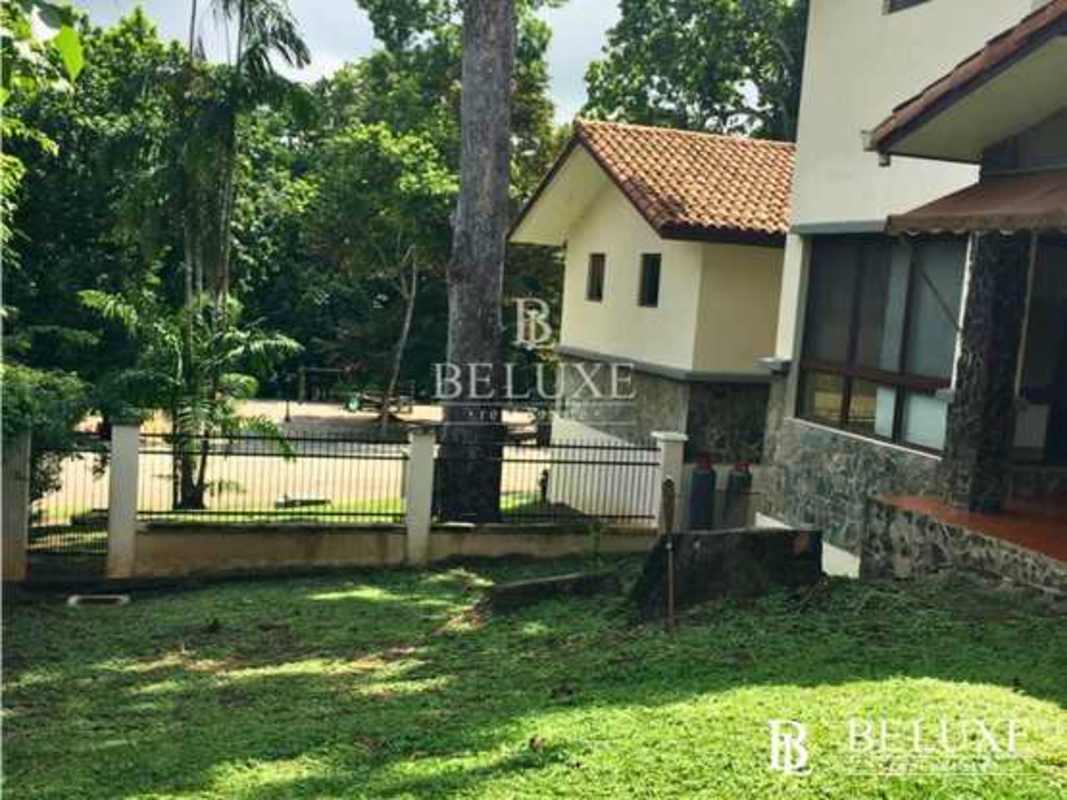 Covered porch with stone columns in Mediterranean house Camino de Cruces Panama
