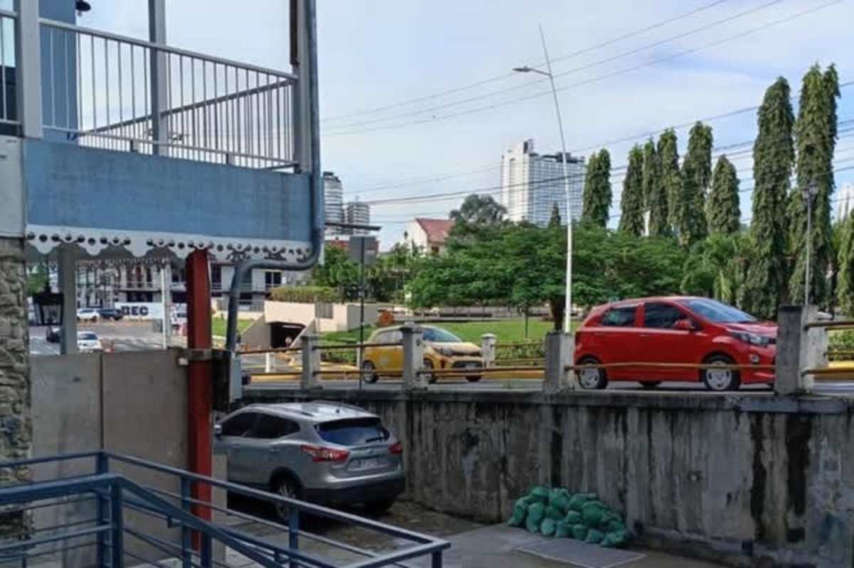 Street view parking and skyline background near La Plazuela Casco Viejo