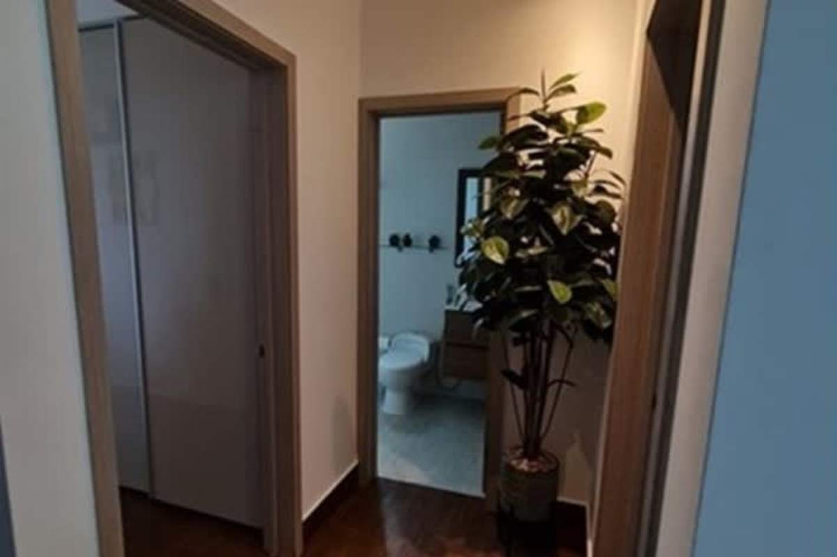 Modern bathroom with glass shower enclosure and vanity in Costa Sur Panama