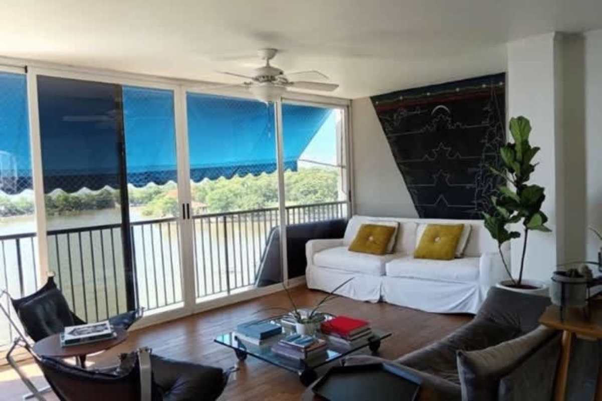 Spacious living area with balcony and waterfront views in PH Coco del Mar Panama City