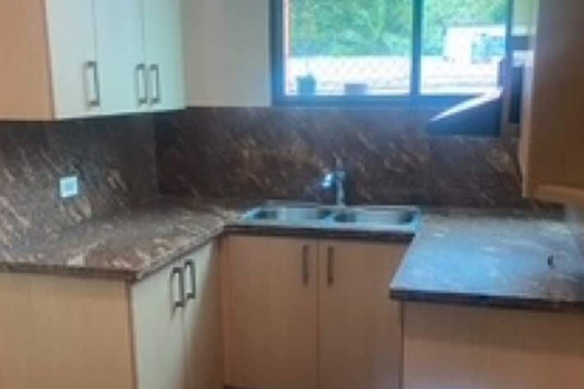 Modern kitchen with granite counters double sink window PH Altavista Hato Pintado Panama