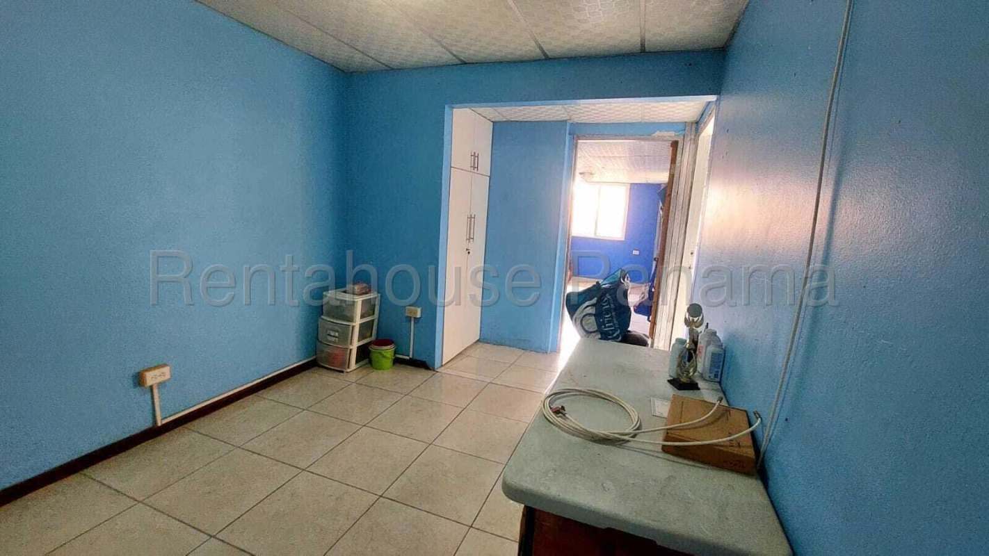 Balcony with metal grilles overlooking neighborhood in duplex Condado del Rey Panama