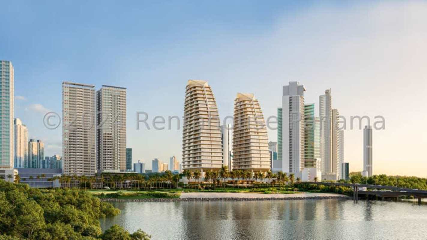 Large tropical swimming pool with cabanas and palm trees at Ipanema Residence Costa del Este Panama