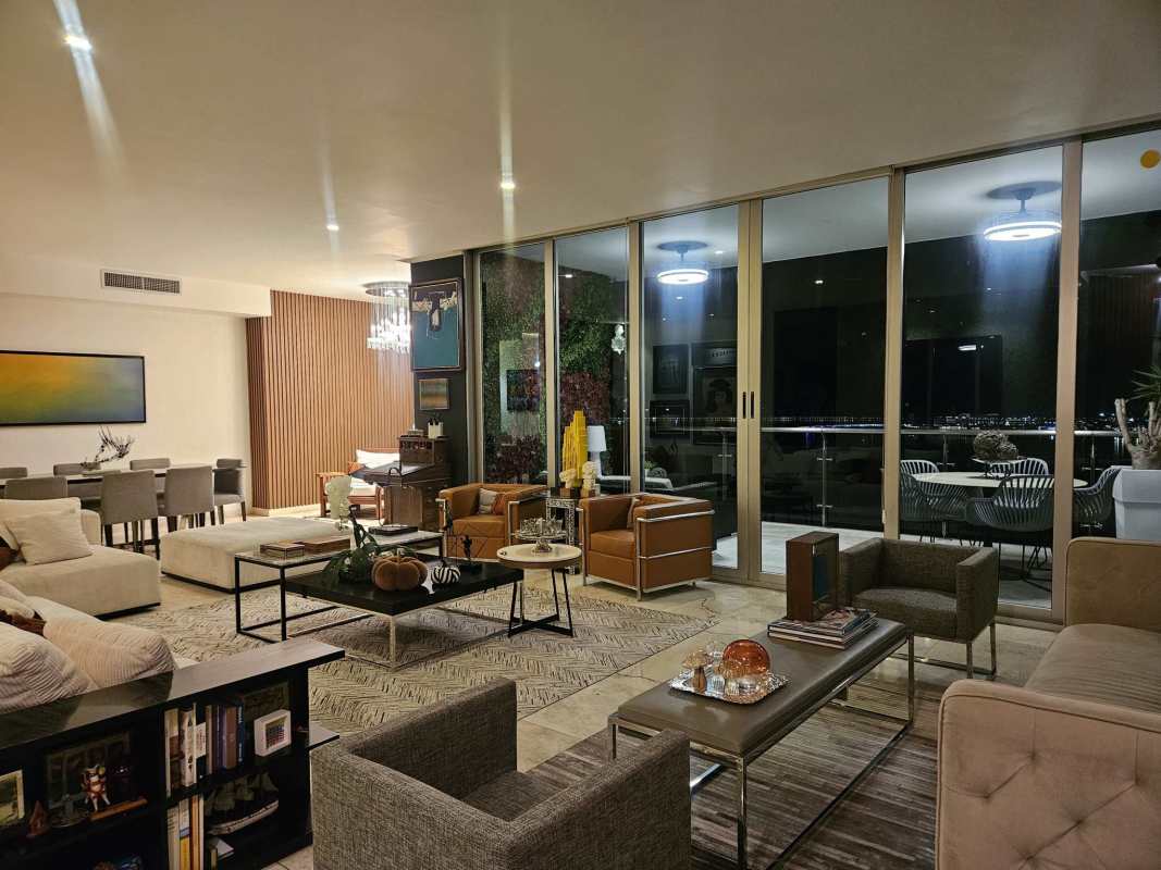 Spacious master bedroom floor-to-ceiling windows ocean and skyline views at PH Aqualina Panama