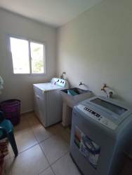 Laundry room with washer dryer and window natural light Bugaba Panama