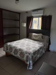 Bedroom with bed, plasma TV, air conditioner, Bugaba Chiriquí