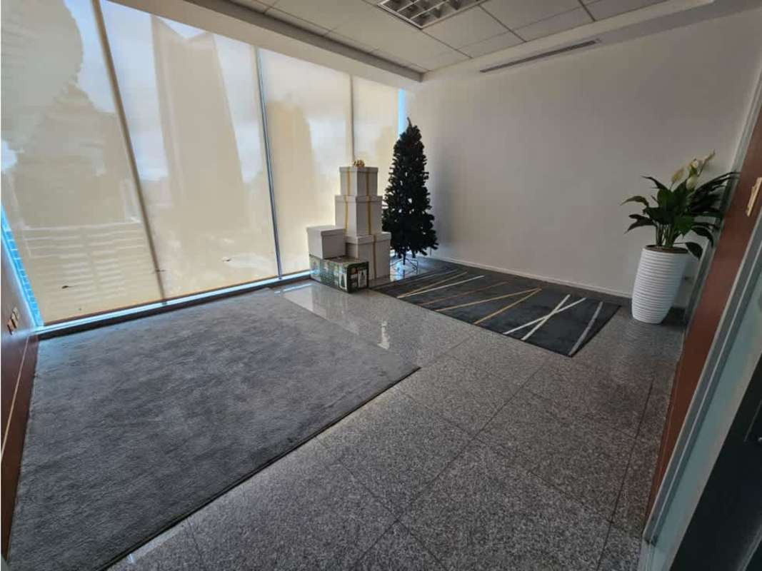 Enclosed executive office with glass wall and granite flooring PH Global Bank Tower Panama City