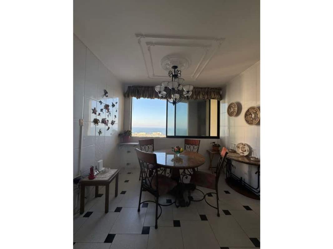 Round dining table with ocean view large window PH Villa Marina Punta Paitilla