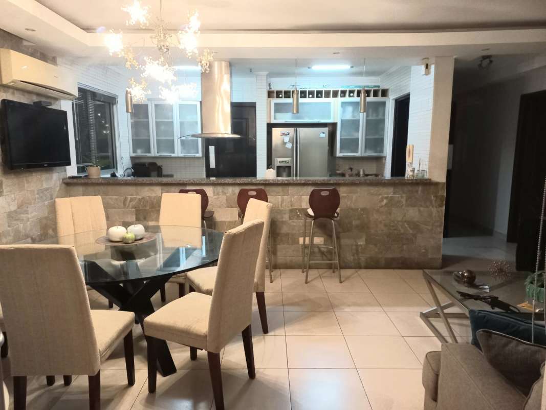 Modern master bathroom with glass shower and double sink at PH Tao Tower Panama