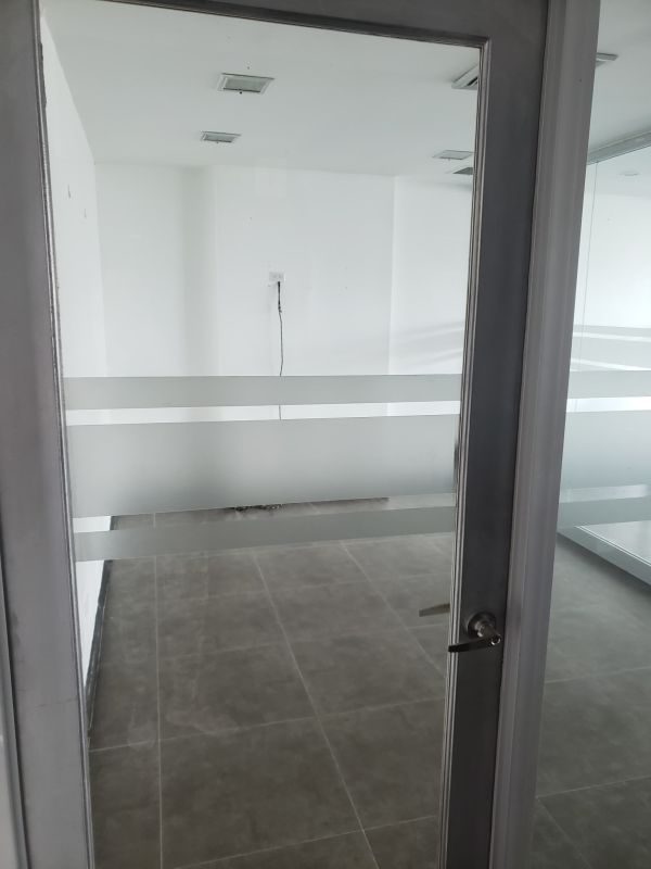 Interior office corridor with glass partitions at PH Camino de Cruces El Dorado Panama