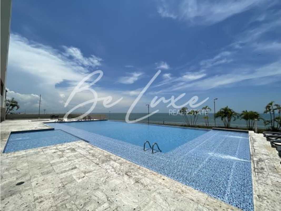 Luxury infinity pool and Jacuzzi area with city and ocean views at PH Terrawind Panama City