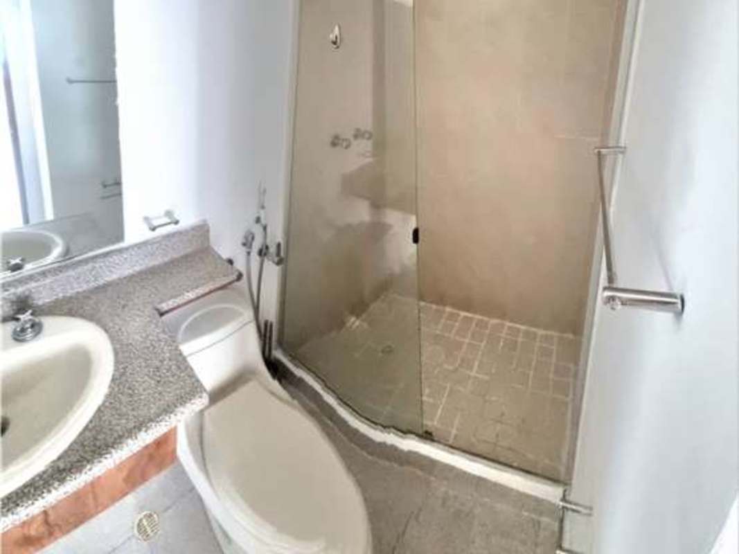 Modern bathroom with granite vanity top, glass shower in PH Terrawind San Francisco Panama