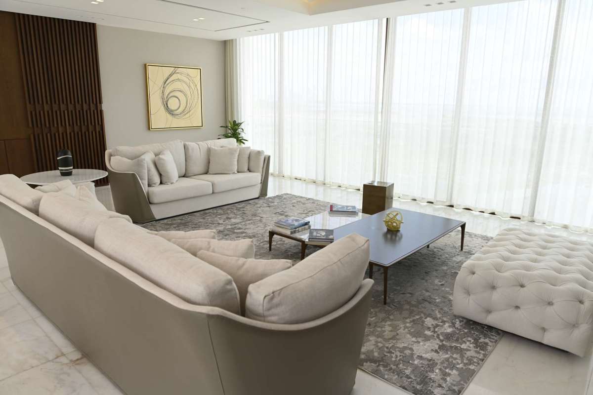 Spacious living room with modern design and city view at PH The Residences Panama