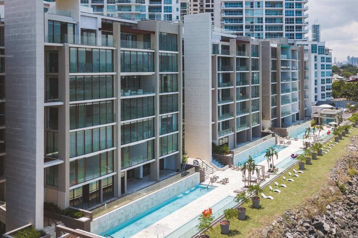 Infinity pool with palm trees and ocean views PH The Residences Punta Pacifica