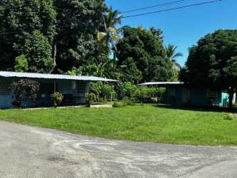 Existing rental apartment structures with metal roofs on large lot in Playa Coronado Panama