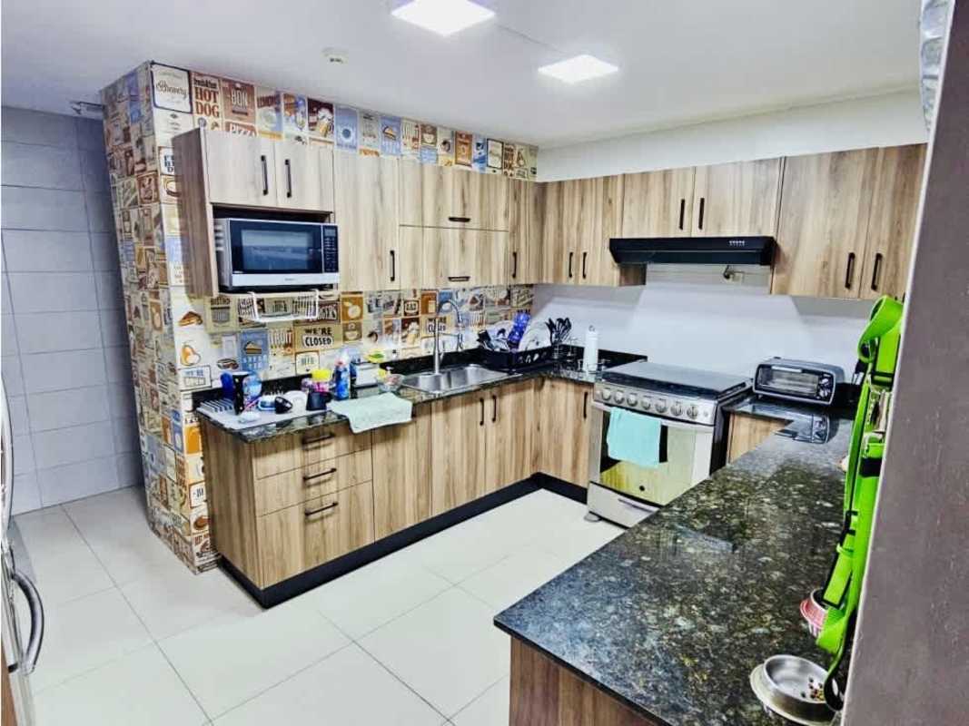 Large built-in wooden closet with doors in master bedroom PH Del Rey El Cangrejo Panama City