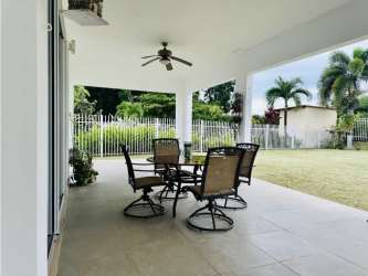 Modern tiled kitchen and dining area in single-family house at Napa Valley Playa Blanca Resort