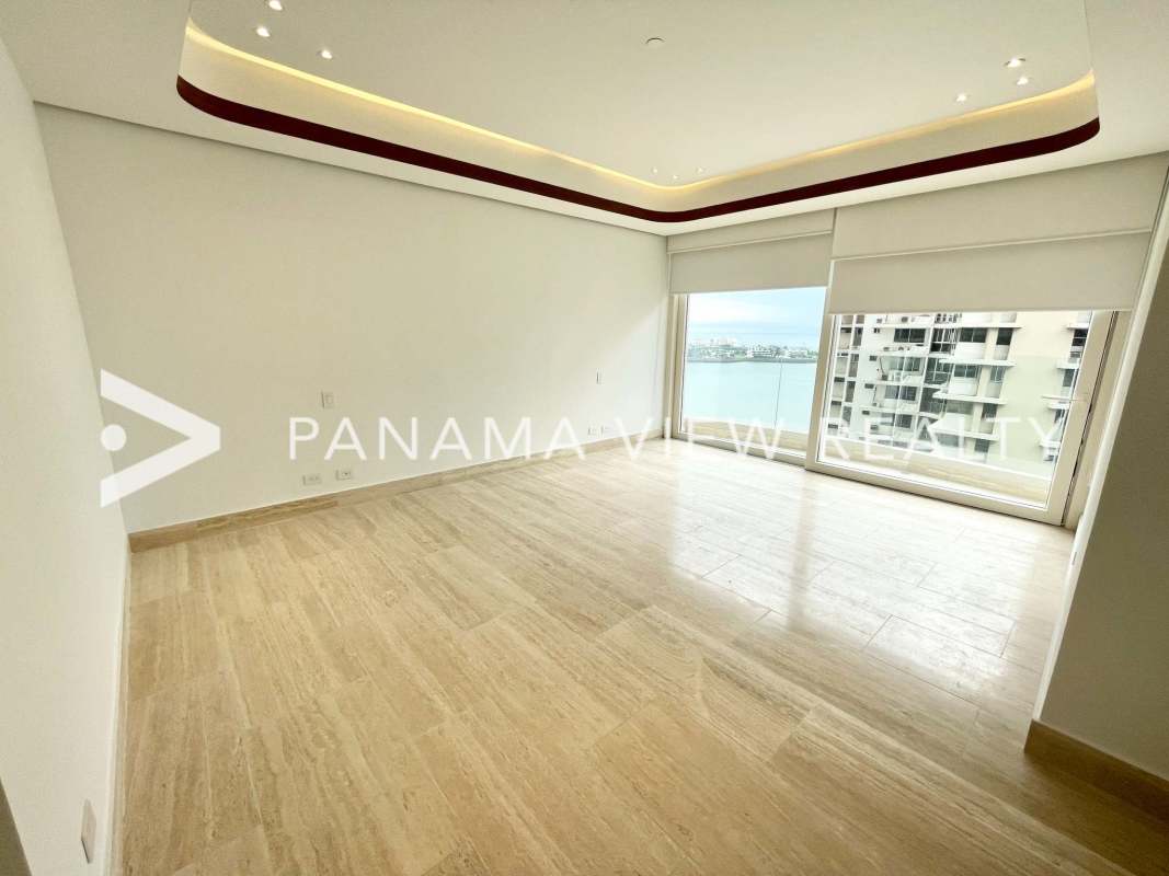 Living room at The Towers in Punta Paitilla featuring large windows, marble flooring and ocean view