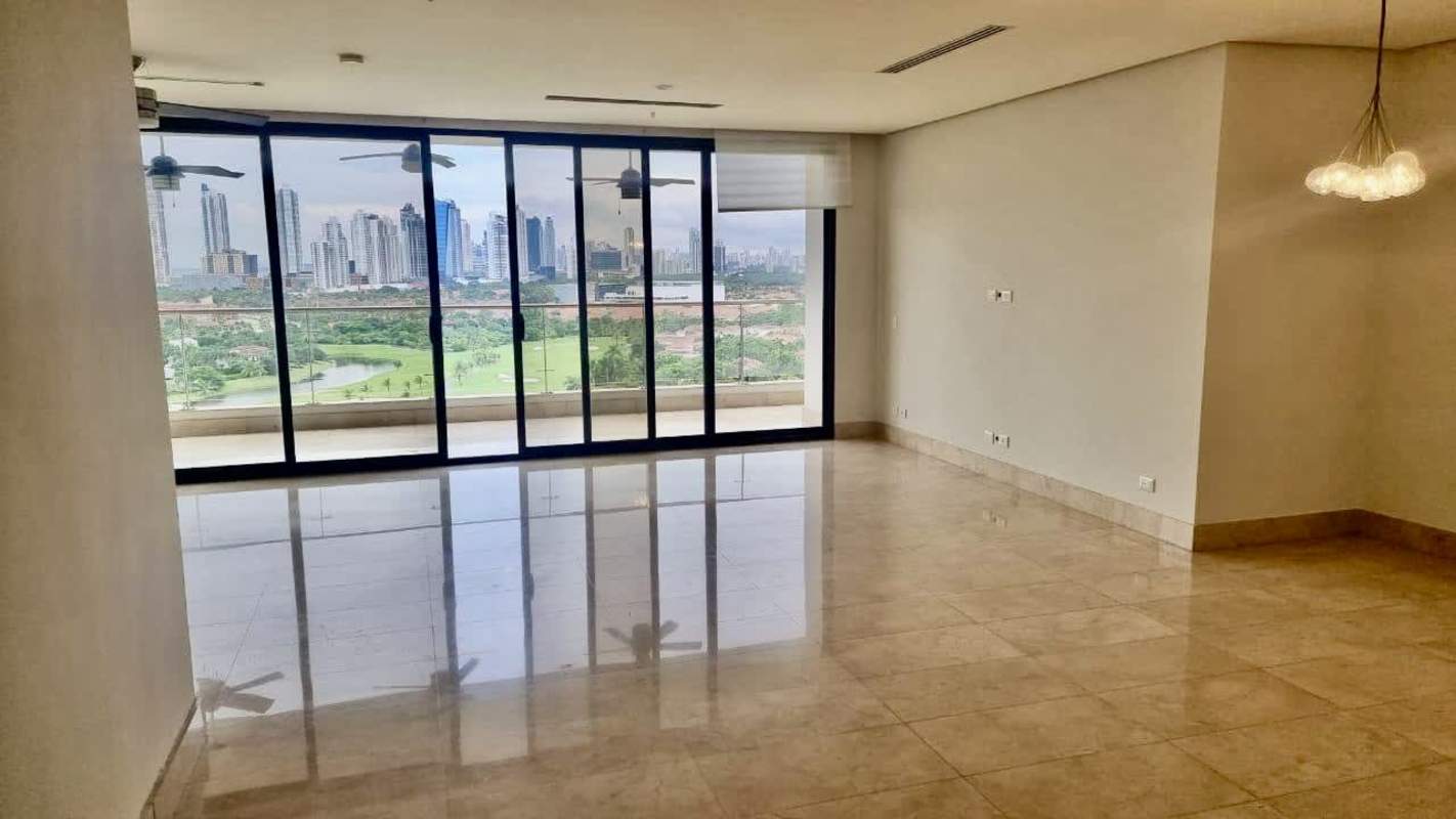 Bright living area with large glass doors to balcony, panoramic skyline and golf course views in Santa María Panama